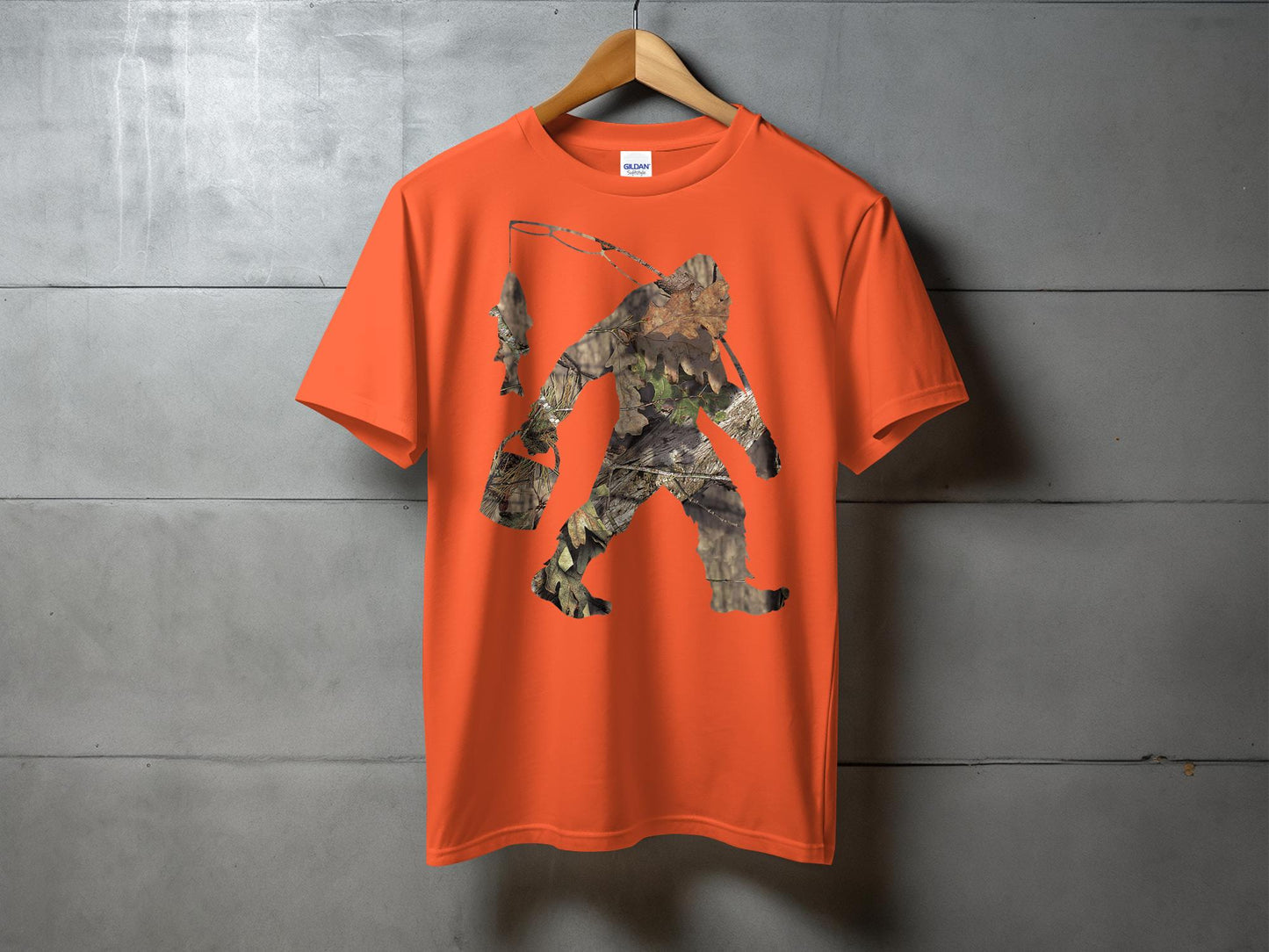 Bigfoot Carrying Fish Hidden in Forest Camouflage T-Shirt