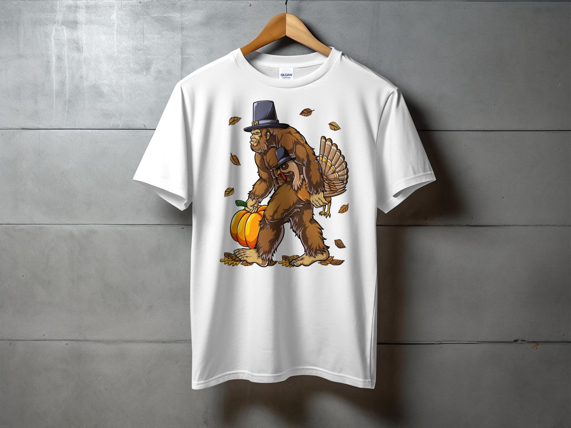 Festive Bigfoot Carrying Pumpkin and Turkey T-Shirt