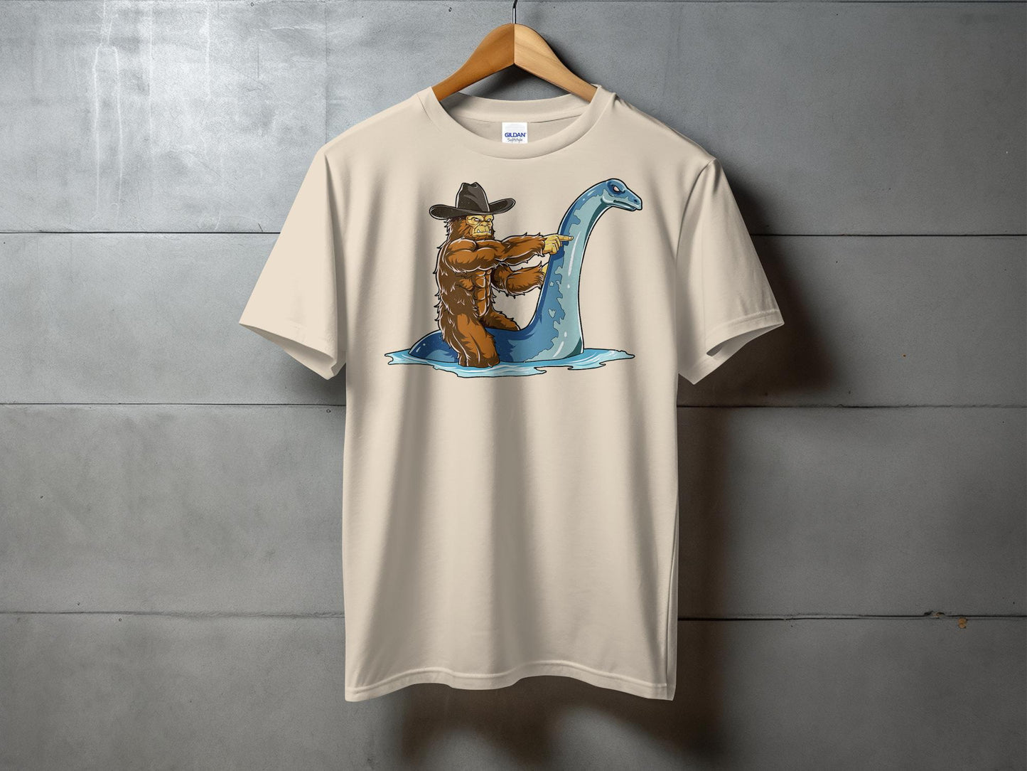 Bigfoot Riding Loch Ness Monster Quirky T-Shirt