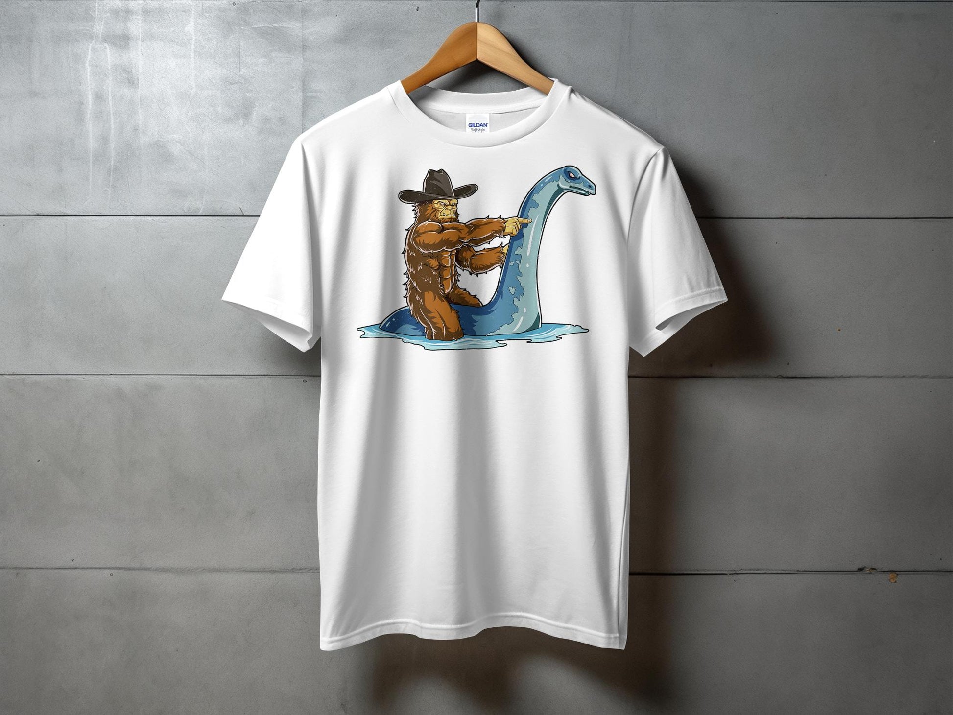 Bigfoot Riding Loch Ness Monster Quirky T-Shirt