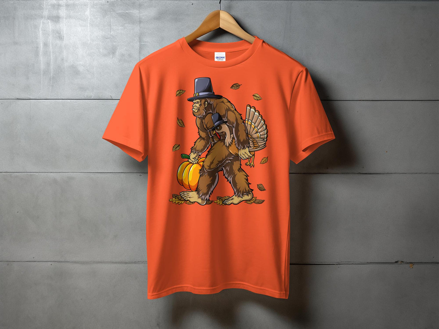 Festive Bigfoot Carrying Pumpkin and Turkey T-Shirt