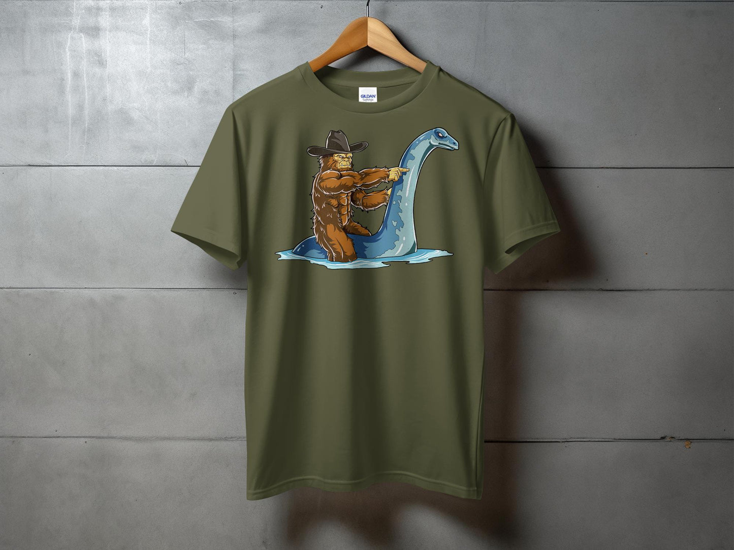 Bigfoot Riding Loch Ness Monster Quirky T-Shirt