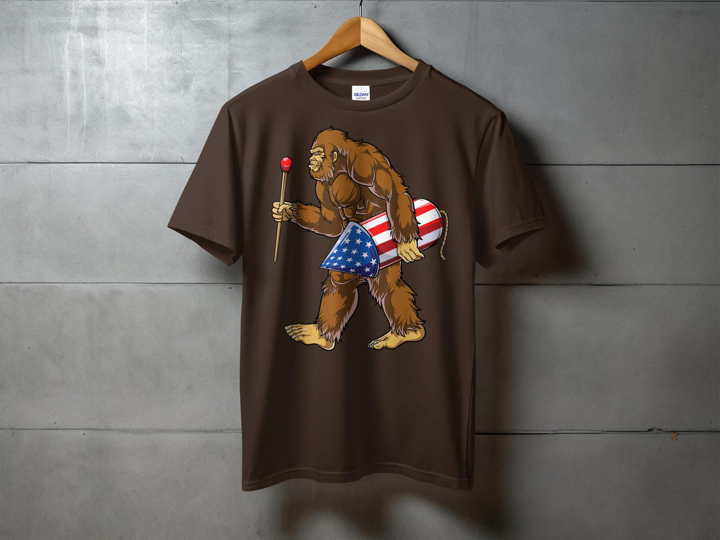 Patriotic Bigfoot Holding Rocket Design Graphic T-Shirt